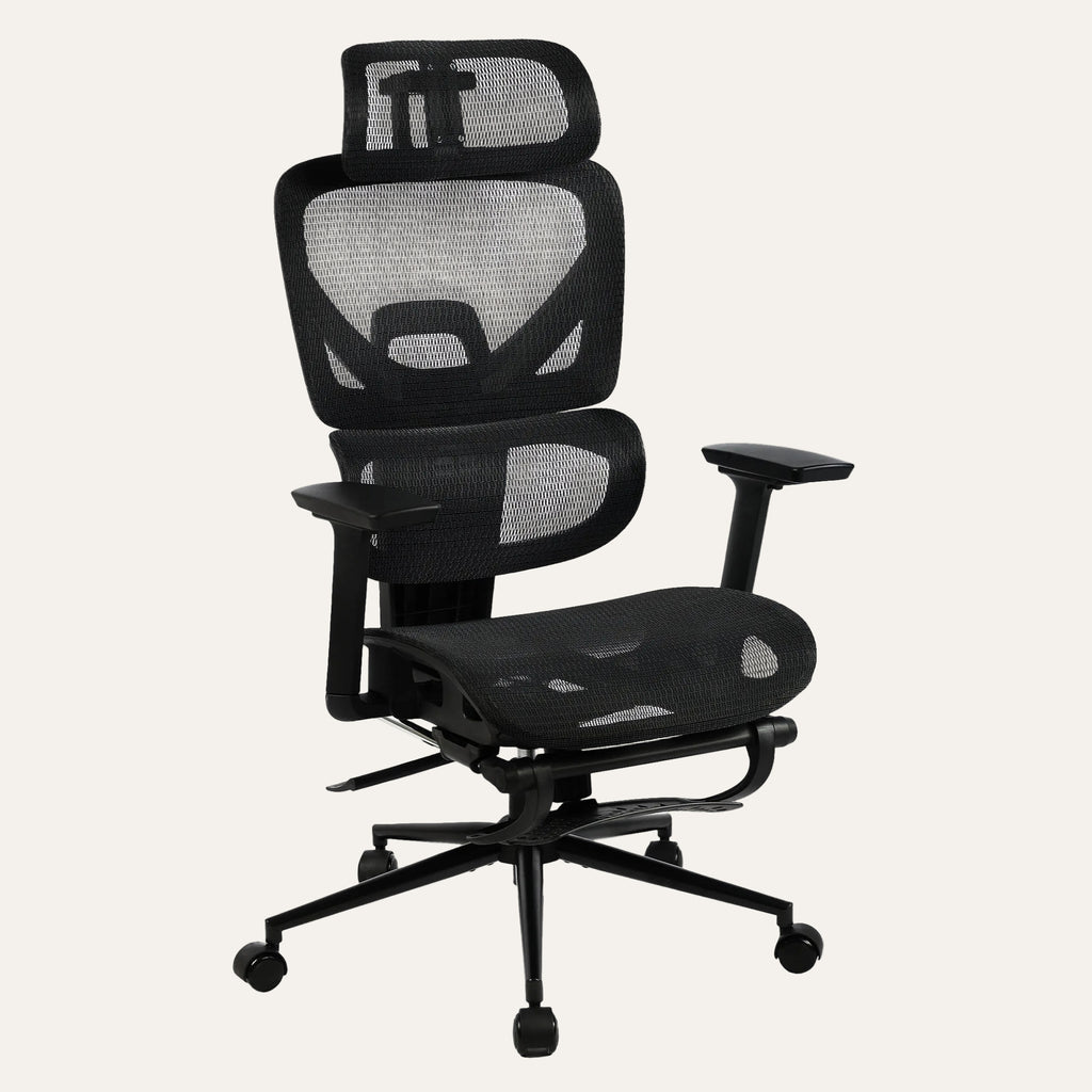 Chaise de bureau ergonomique Elvo Signature noire, entièrement en filet respirant, avec appui-tête et repose-pieds rangé